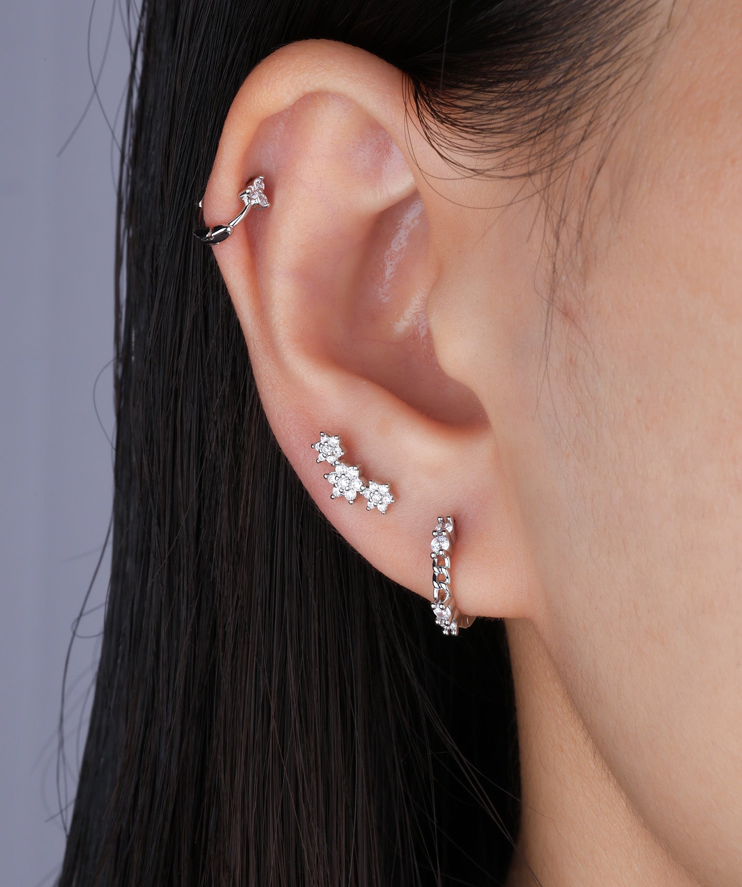 Delicate Curved Flower Stud