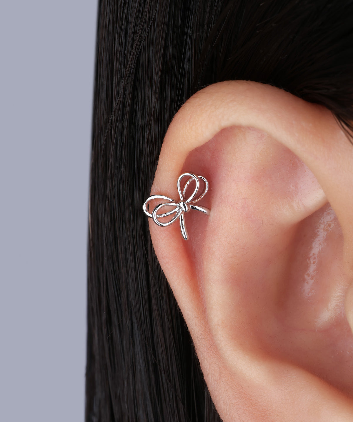 Playful Hollow Bow Flatback Stud - Stainless Steel - Helix, Conch, Flat - Oumo Jewelry