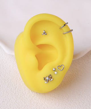 Titanium Spiked Bow Flatback Stud - OumoJewelry